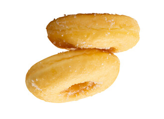 Side view of brown sugar glazed cinnamon donuts in stack isolated with clipping path in png file format