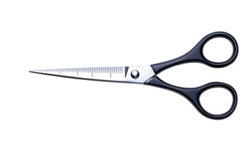 Close up of thinning shears with black handles on a black background