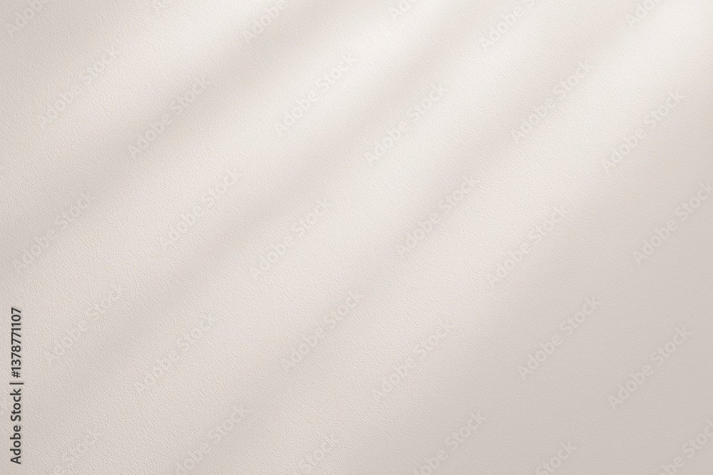 Poster subtle shadows cast by window blinds create a calming and elegant abstract pattern on a textured whi