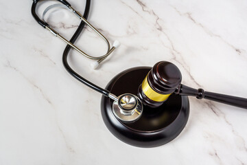 Judge Gavel and stethoscope. Medical law, medical negligence ruling.