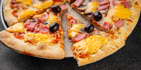 Pizza ham, mushrooms, olives, cheese appetizer vegetable dish fresh delicious gourmet food background on the table rustic food top view copy space