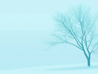 Fototapeta premium Atmospheric Frosty Winter Landscape with Barren Tree Against Blue Sky