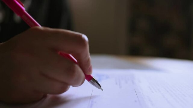 Woman signing document note close up. Selective focus.
