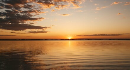 Naklejka premium Serene Sunset over Calm Lake Water Golden Hour Landscape Photography