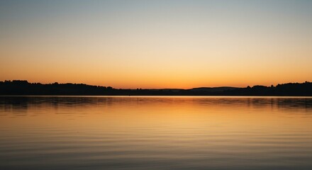 Serene Sunset over Calm Lake Water Golden Hour Landscape Photography