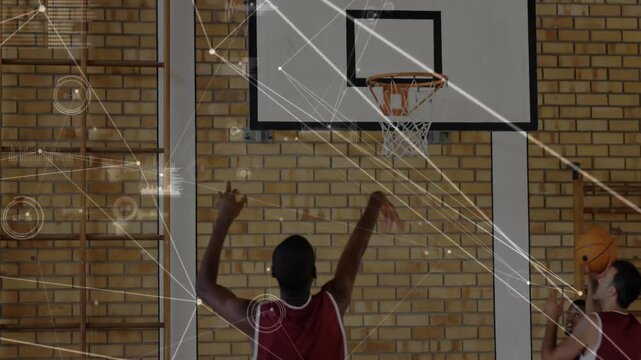 Shooting hoops, basketball players with data processing animation overlay in gym - Powered by Adobe