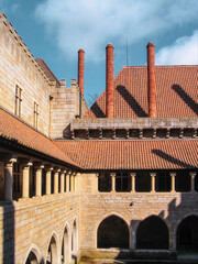 Guimaraes, Portugal. Medieval Royal Palace of the Dukes of Braganza aka Paco dos Duques de Braganca. Courtyard and Chimneys.
