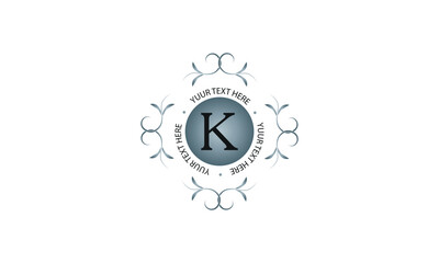 Fototapeta premium Floral monogram for cards, invitations, menus, labels with the letter K in the center. Graphic design of pages, business sign, boutiques, cafes, hotels. Classic design elements for wedding invitations
