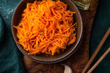 Spicy korean carrot salad in bowl