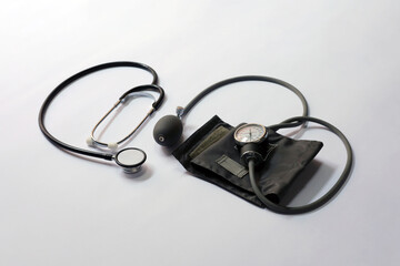 Professional image of a stethoscope and blood pressure meter side by side, highlighting essential...