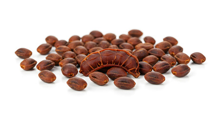 Naklejka premium Pile of Roasted Tamarind Seeds and Pulp Isolated on White Background
