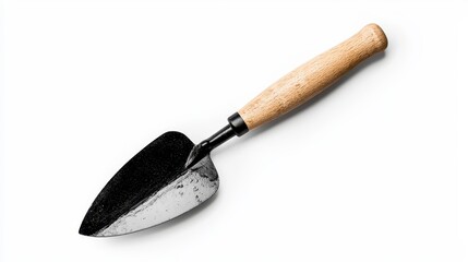 Fototapeta premium Small black garden trowel featu a light brown wooden handle displayed on a clean white background perfect for gardening and landscaping projects