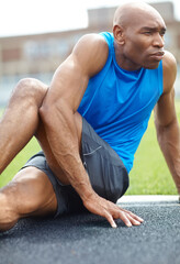 Obraz premium Fitness, outdoor and black man stretching for exercise, body health and ready for cardio at race track. Flexible, warm up legs and athlete prepare for workout, sports and training for competition