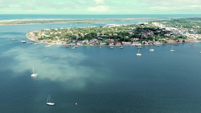 Scenic drone footage of St. Augustine, Florida, showcasing its historic streets, Spanish colonial architecture, and charming coastal atmosphere. Ideal for travel documentaries, tourism content