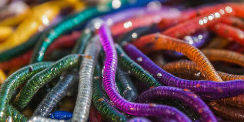 Obraz premium Colorful assortment of fishing worms for bait Generative AI