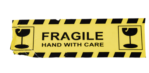 fragile label: yellow warning sticker, hand with care