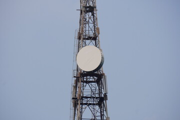A telecommunication tower, which is a structure designed to support antennas and other equipment for wireless communication