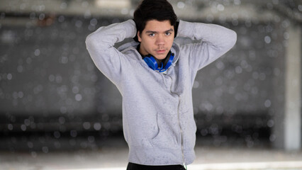Young man running outdoors in winter
