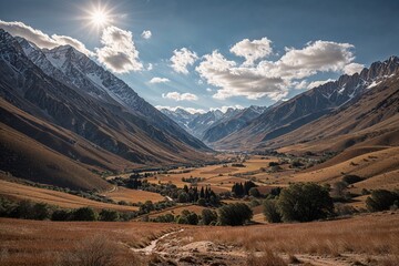 Majestic mountain valley landscape, vast, showcasing natural grandeur, under a bright sky


