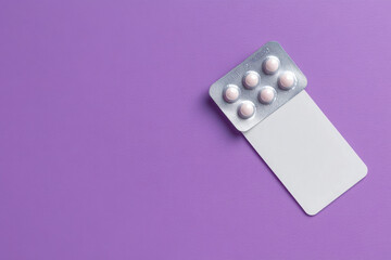 Blister of contraceptive pills and package on lilac background, top view. Space for text 
