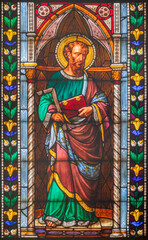 Obraz premium FLORENCE, ITALY - MARCH 21, 2025: The St. Thomas the Apostle in the stained glass of church Chiesa di San Giuseppino by U. de Matteis (1865).