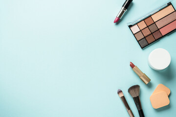 Beauty products on blue background.