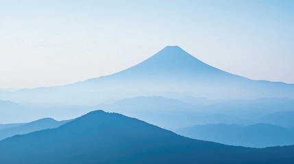 Serene Mountain Landscape in Soft Blue Hues  