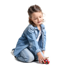 Little girl playing with toy car on white background