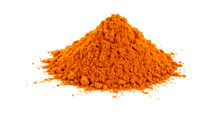 A vibrant pile of turmeric powder against a stark black backdrop in a studio setting showing texture