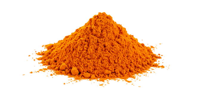 A vibrant pile of turmeric powder against a stark black backdrop in a studio setting showing texture