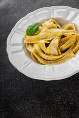 Pappardelle pasta filling main course appetizer vegetable dish fresh gourmet food background on the table rustic food top view copy space