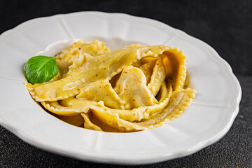 Pappardelle pasta filling main course appetizer vegetable dish fresh gourmet food background on the table rustic food top view copy space