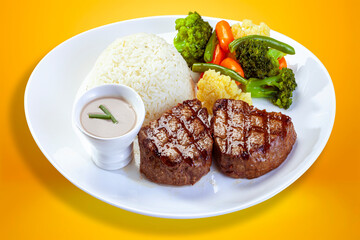 Roasted steak meat, rice and vegetables