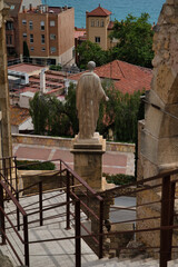 Statue of Caesar Augustus within the walls of the Roman Praetorium Building. Overlooking the Mediterranean Sea as in ancient Tarraco. Tarragona, Catalonia Spain
