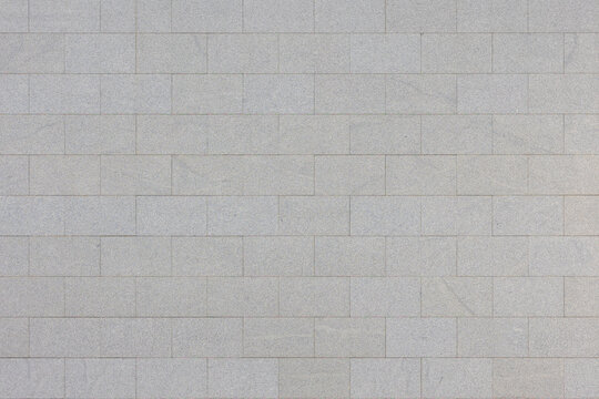 Fototapeta Classic vintage white grey granite background, Abstract geometric brick blocks pattern texture, Outdoor building block wall, Can be used as background for display or montage your products.