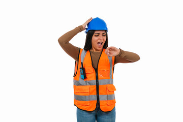 Stressed Latina construction worker checking time and touching helmet on white background