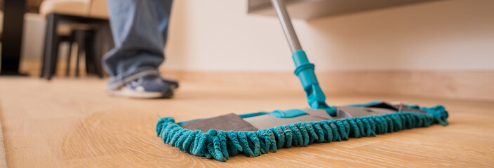 Sparkling Clean: A Woman Mops the Floor