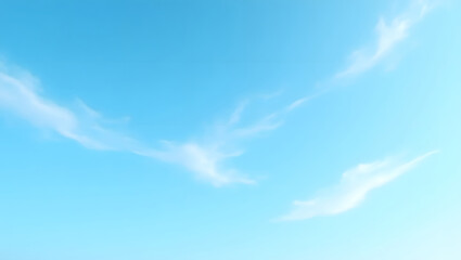 Obraz premium Vibrant blue sky with wispy clouds. 
