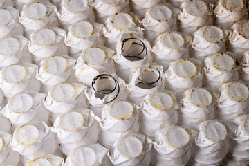 glued together old mattress springs in white fabric after long-term use