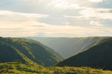 Rolling Green Hills with Mombacho Volcano in the Background