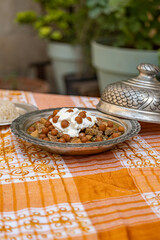 Kemeli Borani served in a copper plate, traditional Sanliurfa dish