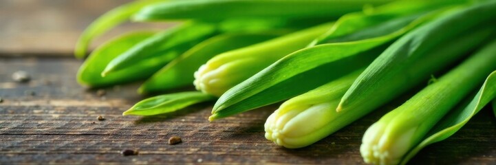 Close-up of exotic lemongrass leaves on a wooden surface, foliage, herbs, wood
