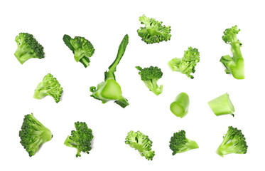 Set fresh uncooked broccoli isolated on white background, top view	