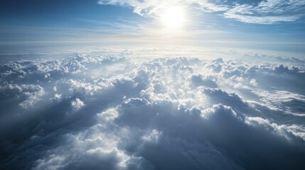 Fototapeta premium Dramatic Aerial View of Fluffy White Clouds Illuminated by Sunlight from Above