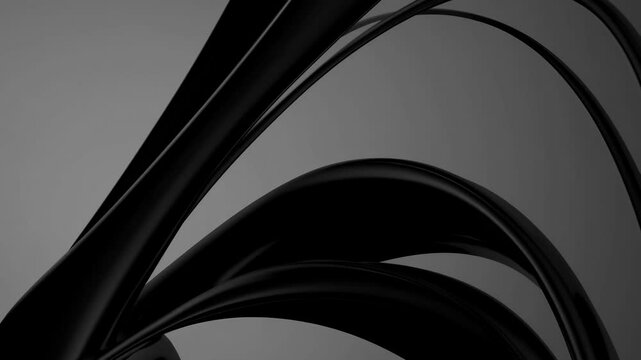 Abstract video concept with sleek black curves on a gray background. Dynamic low-angle shot emphasizes fluidity and modern style. Live desktop wallpaper.
