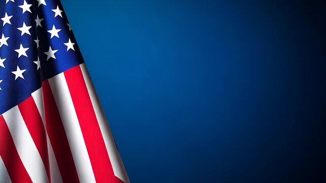An american flag on a blue background. Flag of america waving in the wind. A glare of light blue on the background. A u. s. flag set against a lifestyle blue backdrop.