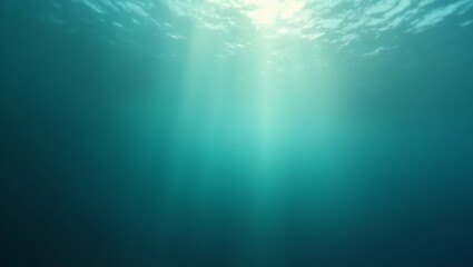 Fototapeta premium Sunlight streams through the surface of the ocean creating a beautiful underwater scene of light