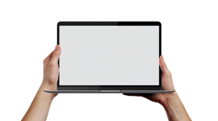 Laptop display in hand: A close-up shot of two hands gently holding a sleek, modern laptop, showcasing its bright screen