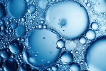 Macro Photography of Soap Bubbles in Water Under Microscope with Cold Blue Light Abstract