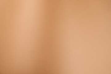Light brown gradient background. Abstract color backdrop for design